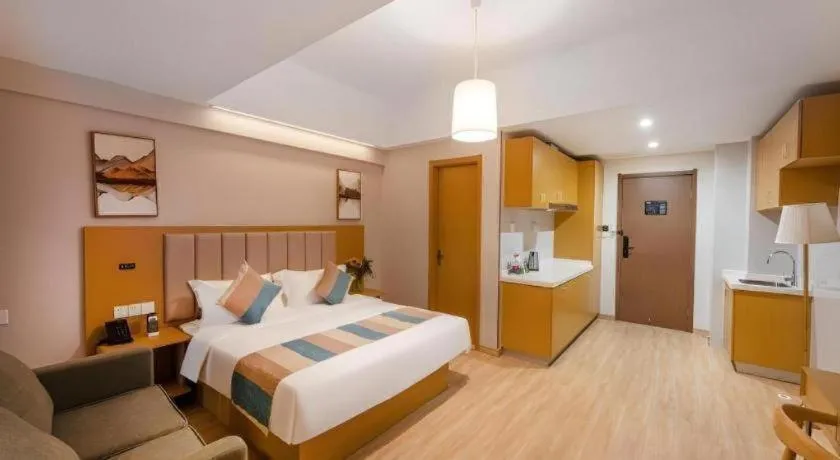 Bed in VX Hotel Wuxi Xinwu District Executive Center Wanda Plaza