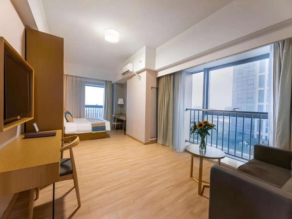 Bed in VX Hotel Wuxi Xinwu District Executive Center Wanda Plaza