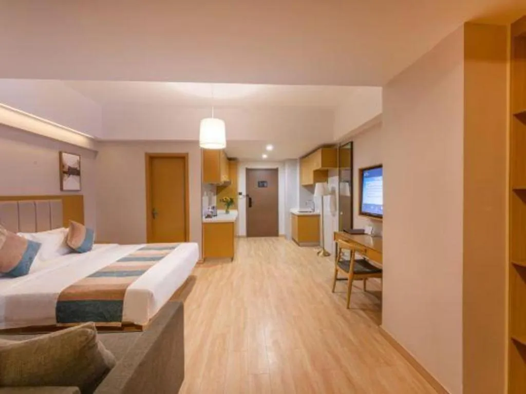 Bed in VX Hotel Wuxi Xinwu District Executive Center Wanda Plaza