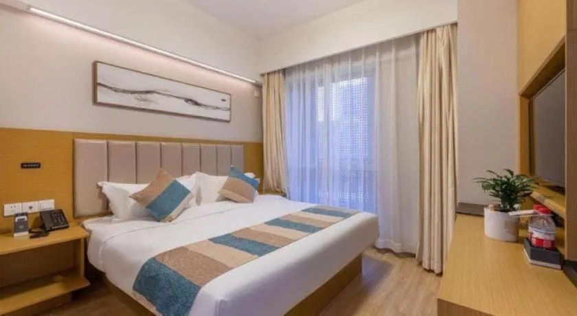 Bed in VX Hotel Wuxi Xinwu District Executive Center Wanda Plaza