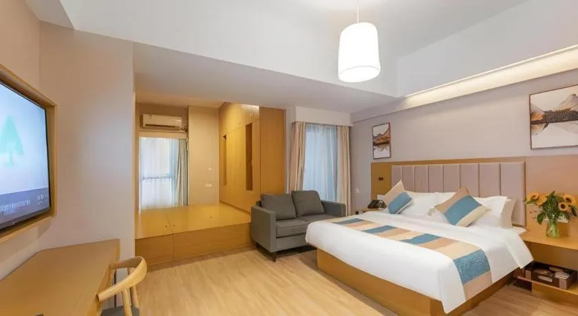 Bed in VX Hotel Wuxi Xinwu District Executive Center Wanda Plaza