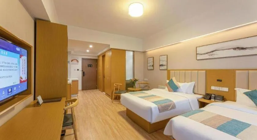 Bed in VX Hotel Wuxi Xinwu District Executive Center Wanda Plaza