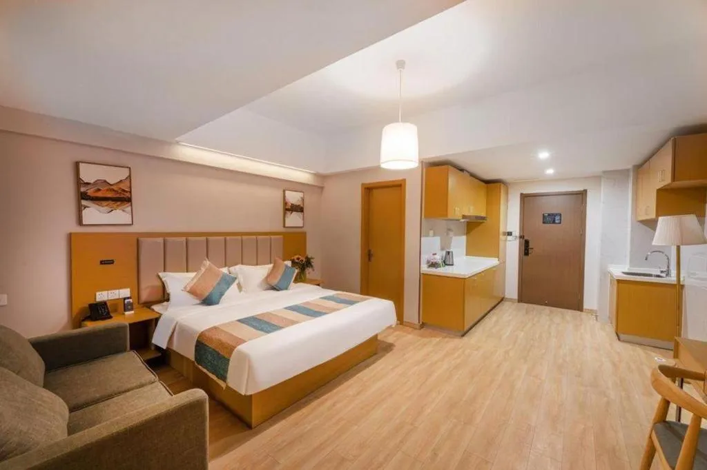 Bed in VX Hotel Wuxi Xinwu District Executive Center Wanda Plaza