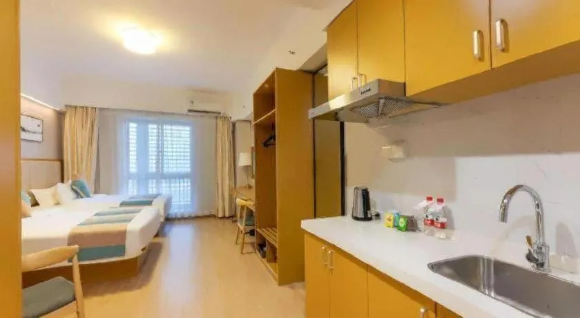 Bed in VX Hotel Wuxi Xinwu District Executive Center Wanda Plaza