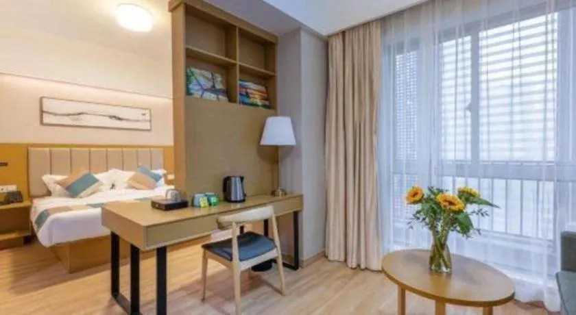 Bed in VX Hotel Wuxi Xinwu District Executive Center Wanda Plaza