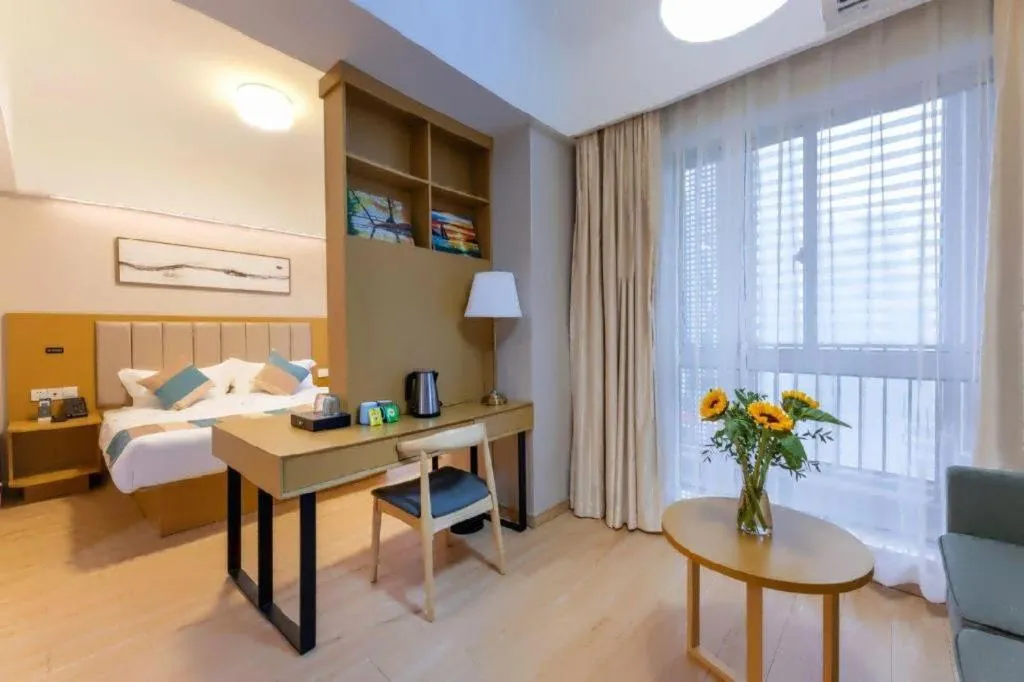 Bed in VX Hotel Wuxi Xinwu District Executive Center Wanda Plaza