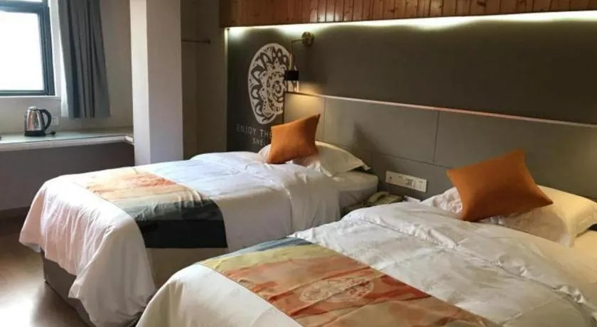 Bed in Shell Hotel Shanghai Minhang District Wenjing Road Metro Station