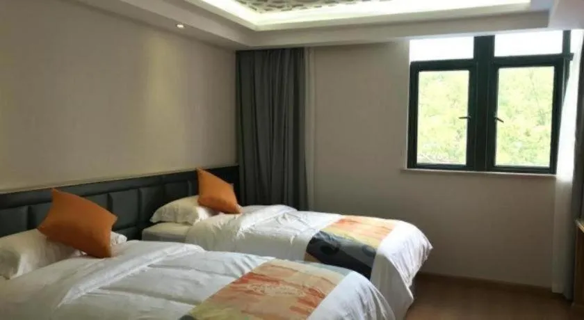 Bed in Shell Hotel Shanghai Minhang District Wenjing Road Metro Station