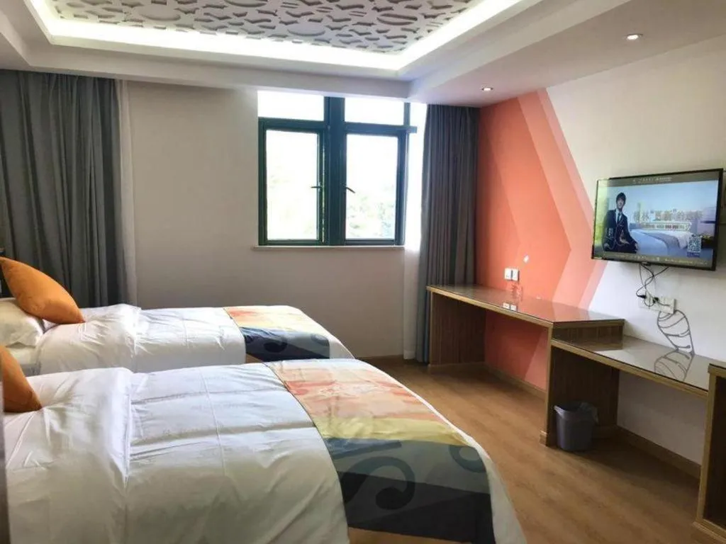 Bed in Shell Hotel Shanghai Minhang District Wenjing Road Metro Station