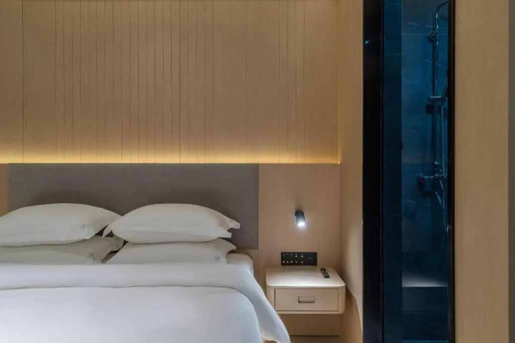 Bed in Deep Sleep Hotel Xuzhou High-Speed Railway Station East Square Oubeisha