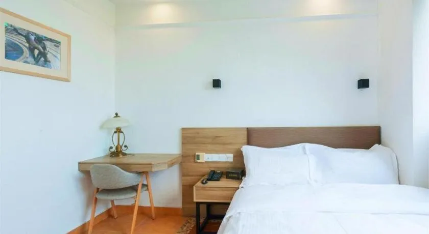 Bed in GreenTree Alliance Hotel Shanghai Baoshan District Meilan Lake Yueluo Road