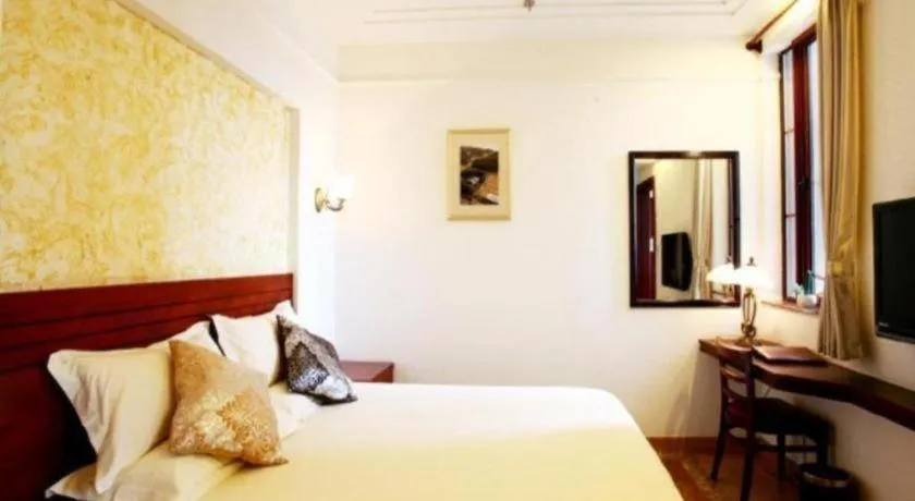 Bed in GreenTree Alliance Hotel Shanghai Baoshan District Meilan Lake Yueluo Road