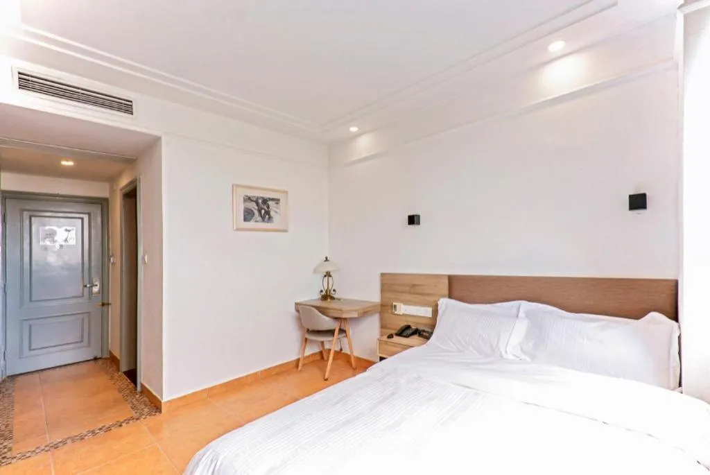 Bed in GreenTree Alliance Hotel Shanghai Baoshan District Meilan Lake Yueluo Road