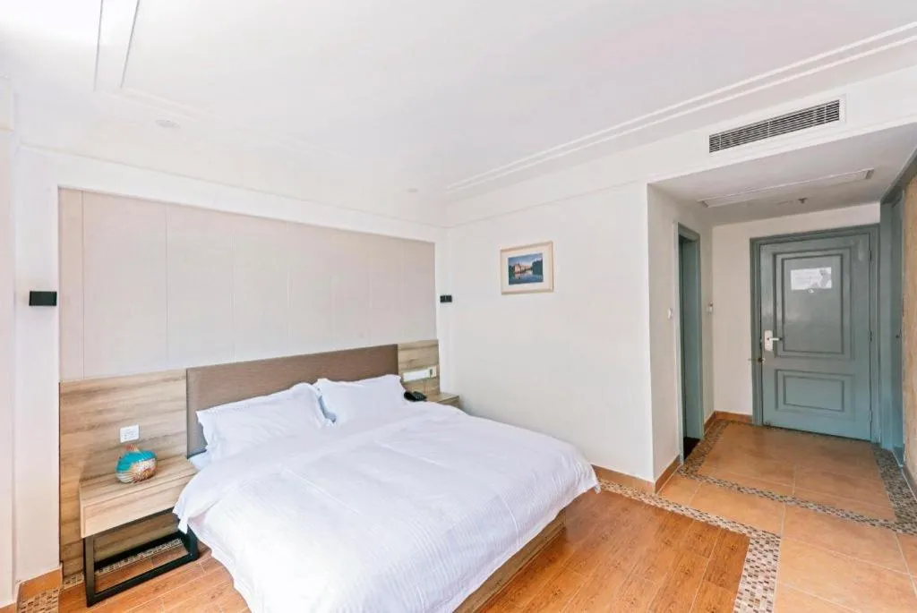 Bed in GreenTree Alliance Hotel Shanghai Baoshan District Meilan Lake Yueluo Road