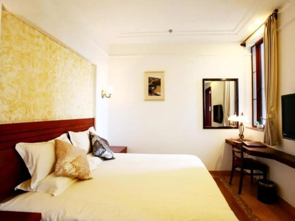 Bed in GreenTree Alliance Hotel Shanghai Baoshan District Meilan Lake Yueluo Road