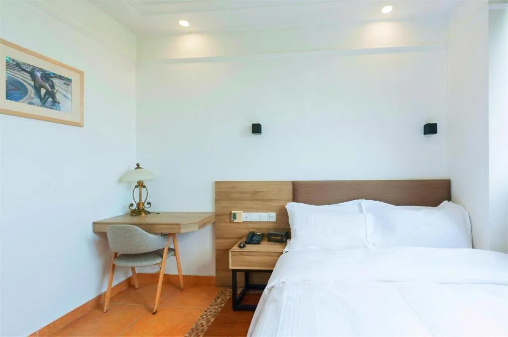 Bed in GreenTree Alliance Hotel Shanghai Baoshan District Meilan Lake Yueluo Road