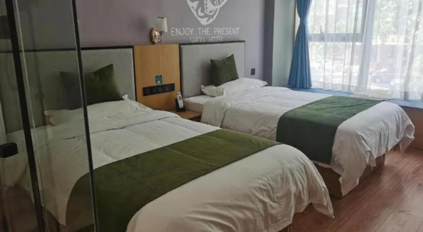 Bed in Shell Hotel Anhui Huaibei Railway Station Huiyuan Road