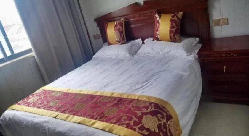 Bed in Shell Hotel Wuxi Jiangyin Zhutang Town