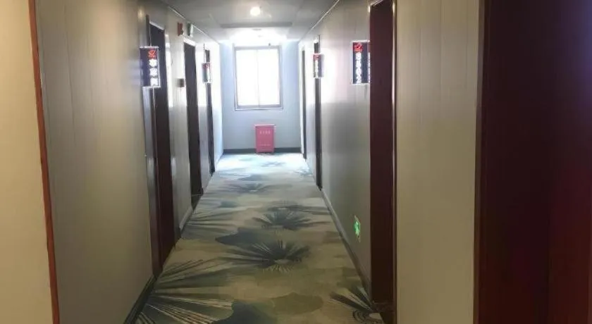 Bed in Shell Hotel Wuxi Jiangyin Zhutang Town