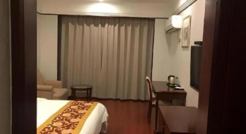 Bed in Shell Hotel Wuxi Jiangyin Zhutang Town