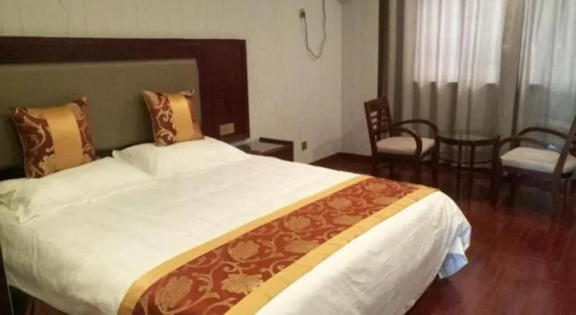 Bed in Shell Hotel Wuxi Jiangyin Zhutang Town