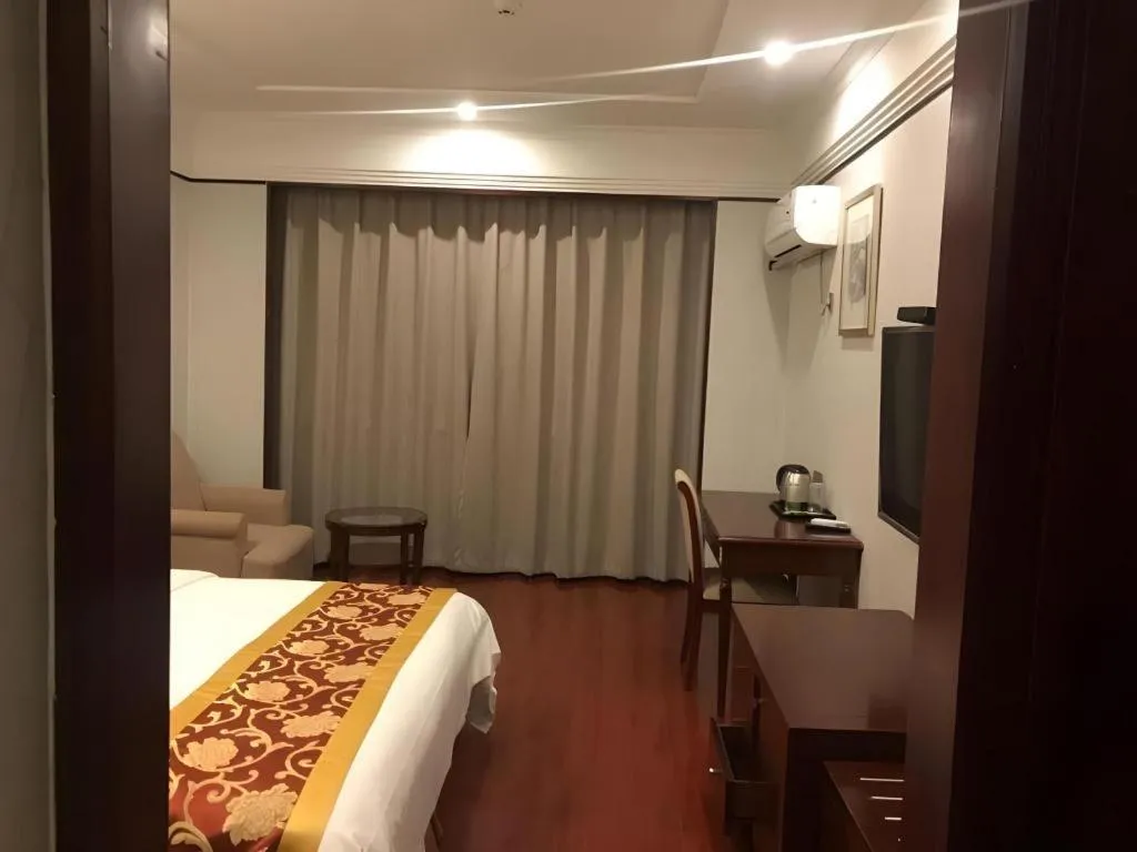 Bed in Shell Hotel Wuxi Jiangyin Zhutang Town