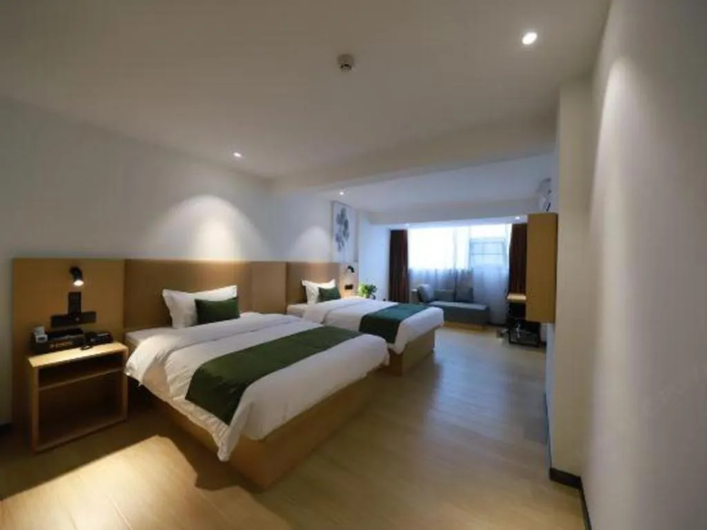 Bed in Green Tree Inn Guangxi Wuzhou 2nd Xinxing Road Liangguang Market