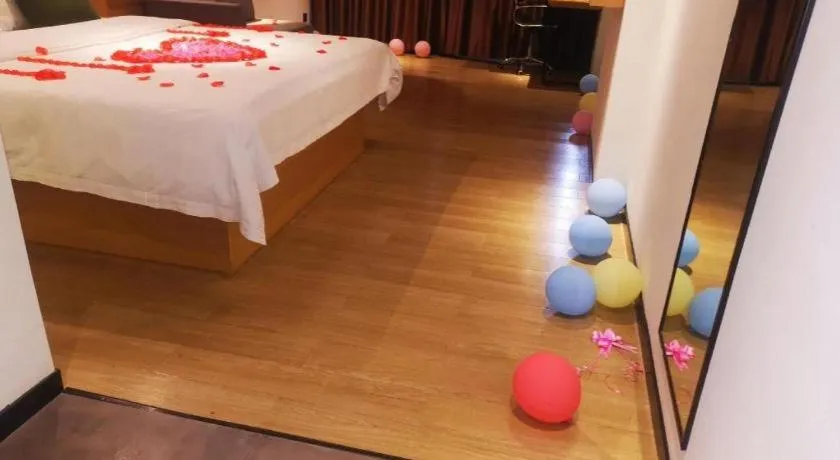 Bed in Green Tree Inn Guangxi Wuzhou 2nd Xinxing Road Liangguang Market