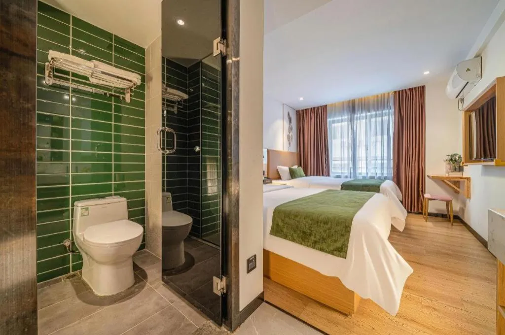 Bed in Green Tree Inn Guangxi Wuzhou 2nd Xinxing Road Liangguang Market