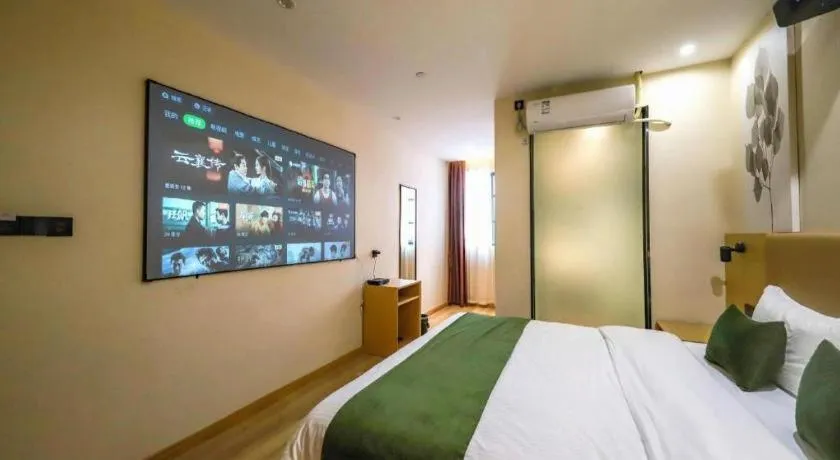 Bed in Green Tree Inn Guangxi Wuzhou 2nd Xinxing Road Liangguang Market