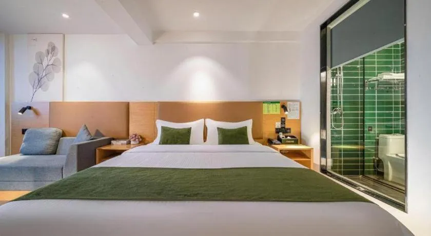 Bed in Green Tree Inn Guangxi Wuzhou 2nd Xinxing Road Liangguang Market