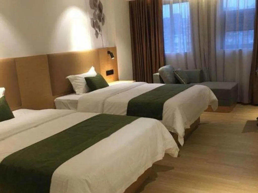 Bed in Green Tree Inn Guangxi Wuzhou 2nd Xinxing Road Liangguang Market