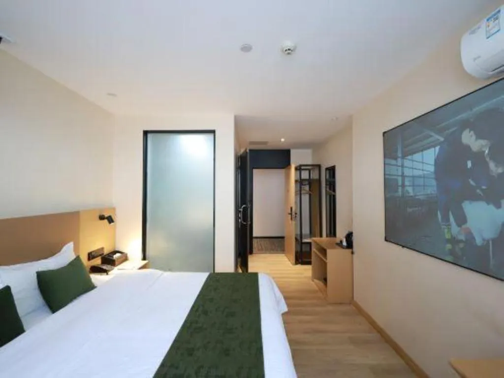 Bed in Green Tree Inn Guangxi Wuzhou 2nd Xinxing Road Liangguang Market