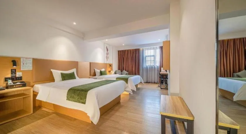 Bed in Green Tree Inn Guangxi Wuzhou 2nd Xinxing Road Liangguang Market