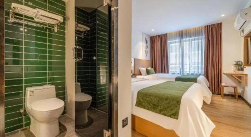 Bed in Green Tree Inn Guangxi Wuzhou 2nd Xinxing Road Liangguang Market