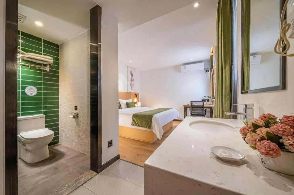 Bed in Green Tree Inn Guangxi Wuzhou 2nd Xinxing Road Liangguang Market