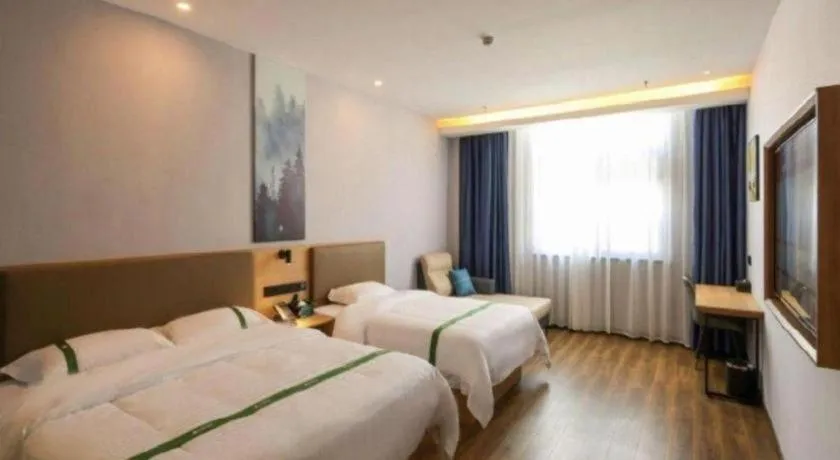 Bed in Green Tree Inn Guangxi Wuzhou 2nd Xinxing Road Liangguang Market