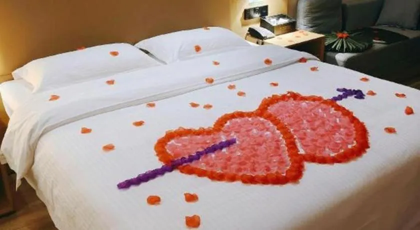 Bed in Green Tree Inn Guangxi Wuzhou 2nd Xinxing Road Liangguang Market