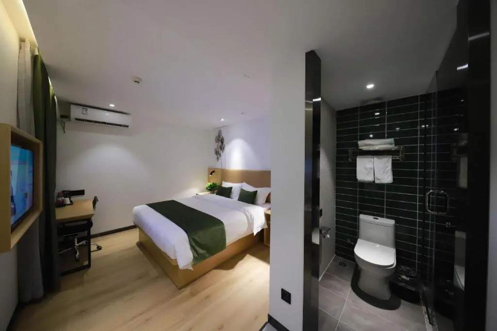 Bed in Green Tree Inn Guangxi Wuzhou 2nd Xinxing Road Liangguang Market