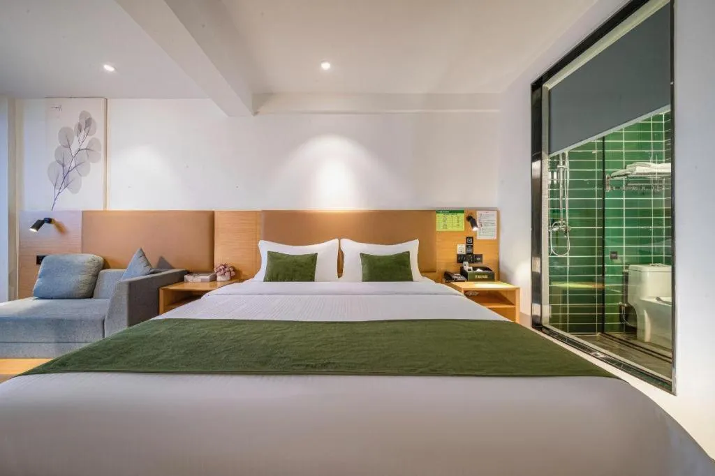 Bed in Green Tree Inn Guangxi Wuzhou 2nd Xinxing Road Liangguang Market