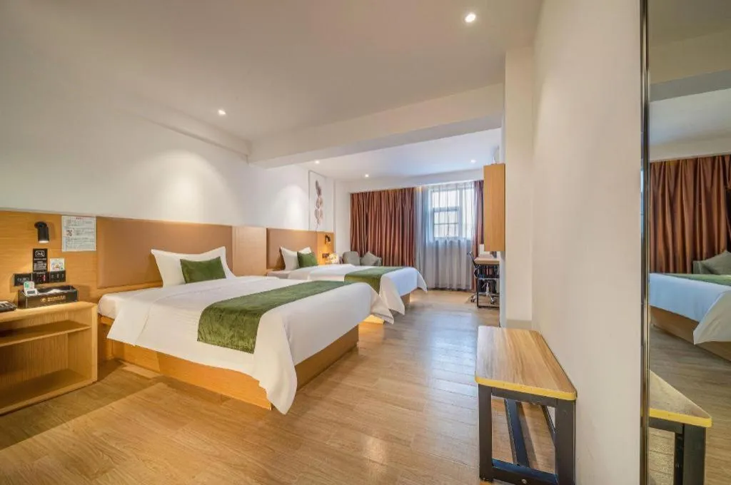 Bed in Green Tree Inn Guangxi Wuzhou 2nd Xinxing Road Liangguang Market