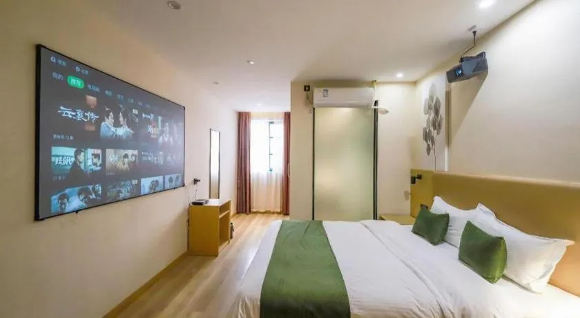 Bed in Green Tree Inn Guangxi Wuzhou 2nd Xinxing Road Liangguang Market