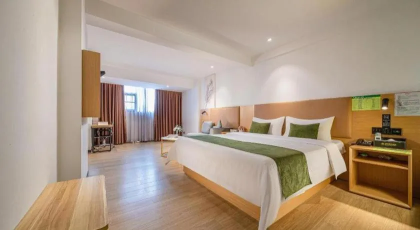 Bed in Green Tree Inn Guangxi Wuzhou 2nd Xinxing Road Liangguang Market