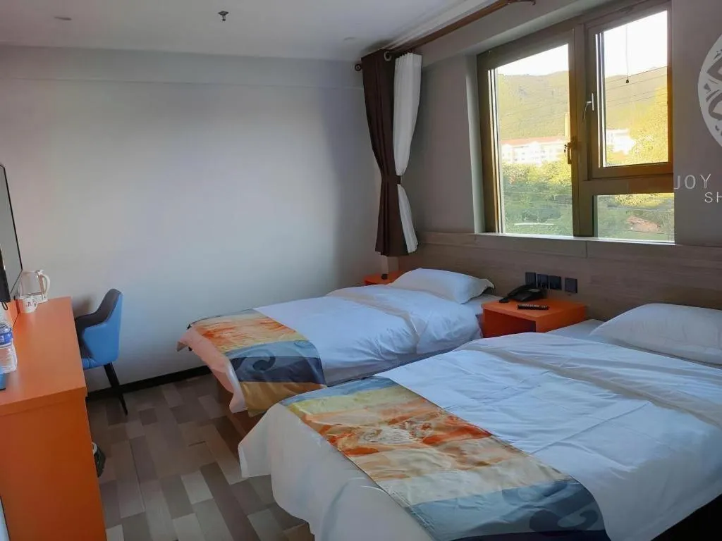 Bed in Shell Hotel Beijing Miyun District Shuiku Yangguang