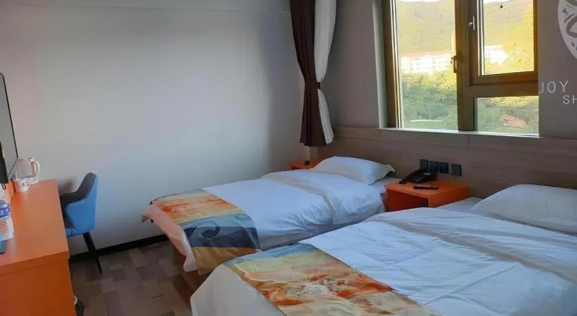 Bed in Shell Hotel Beijing Miyun District Shuiku Yangguang