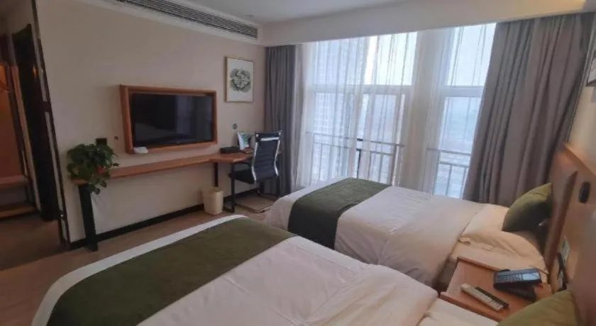 Bed in Green Tree Inn Fuyang Funan County Tianzhu Square
