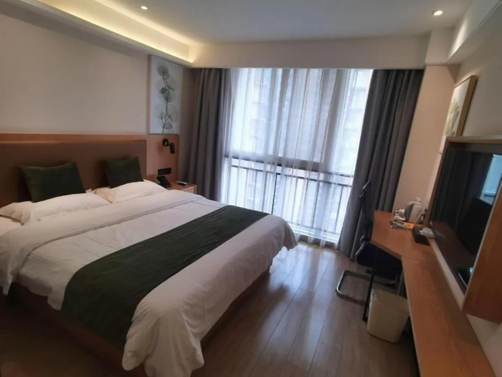 Bed in Green Tree Inn Fuyang Funan County Tianzhu Square