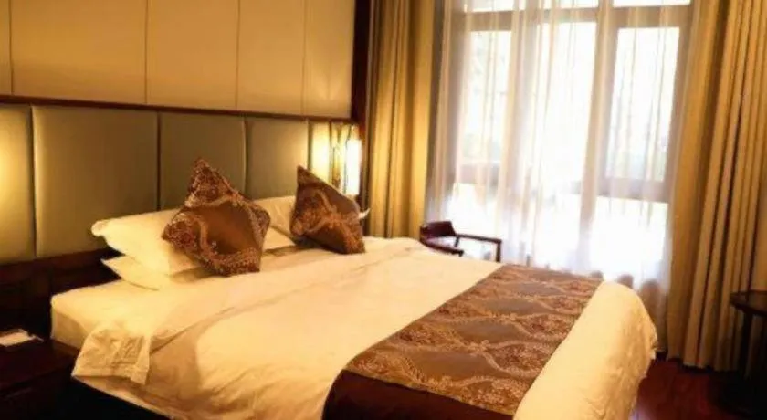 Bed in GreenTree Eastern Hotel Linyi Linshu County Aegean Sea