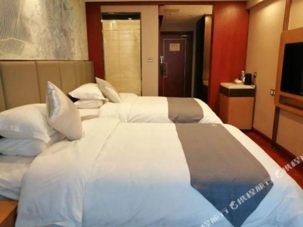 Bed in GreenTree Eastern Hotel Linyi Linshu County Aegean Sea