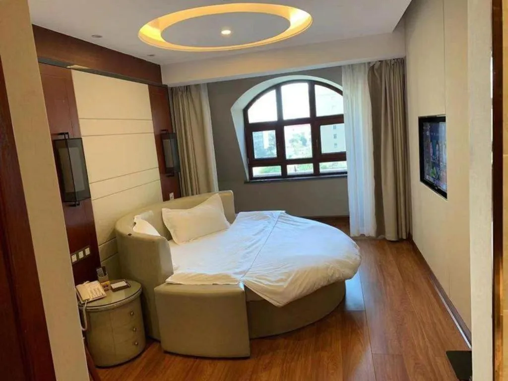 Bed in GreenTree Eastern Hotel Linyi Linshu County Aegean Sea